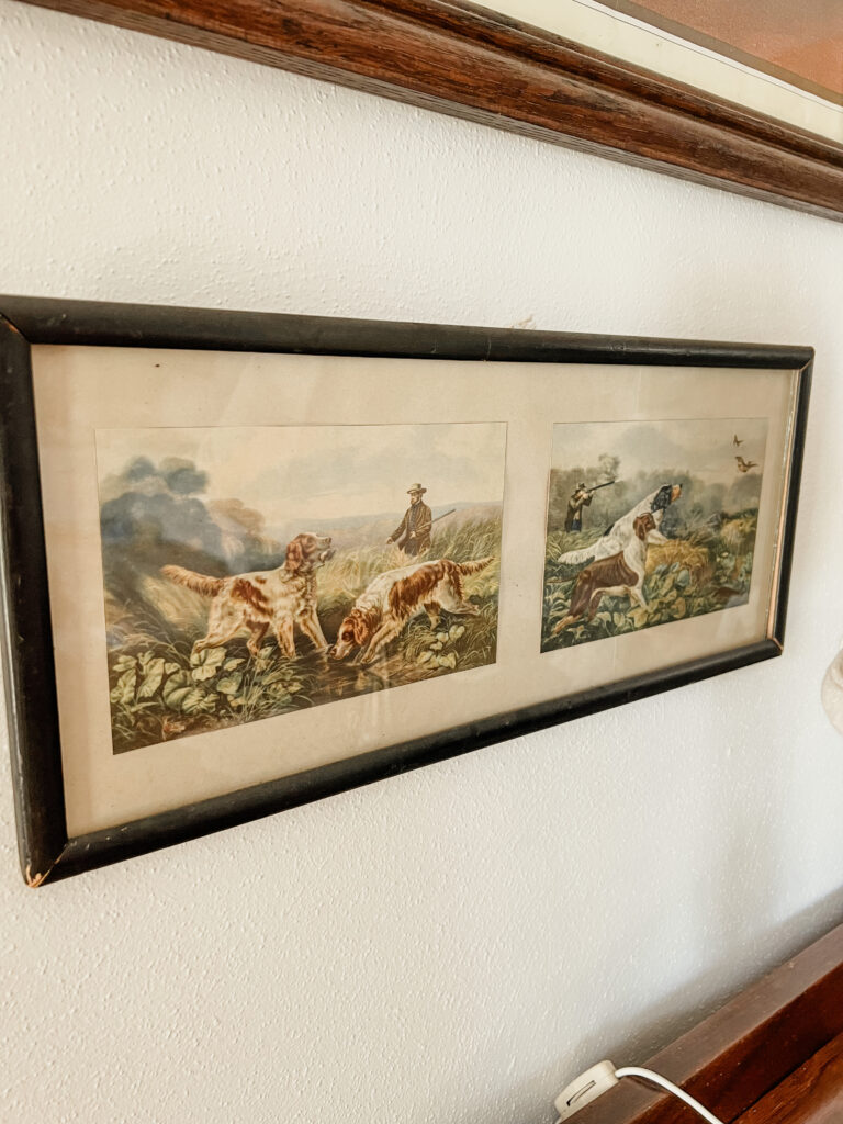 Antique picture of bird dogs hunting.